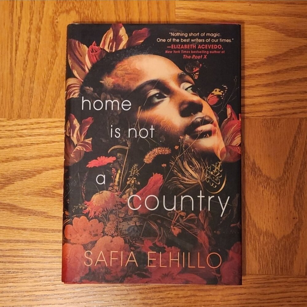 ⭐ HOST PICK ⭐ Home Is Not A Country by Safia Elhillo